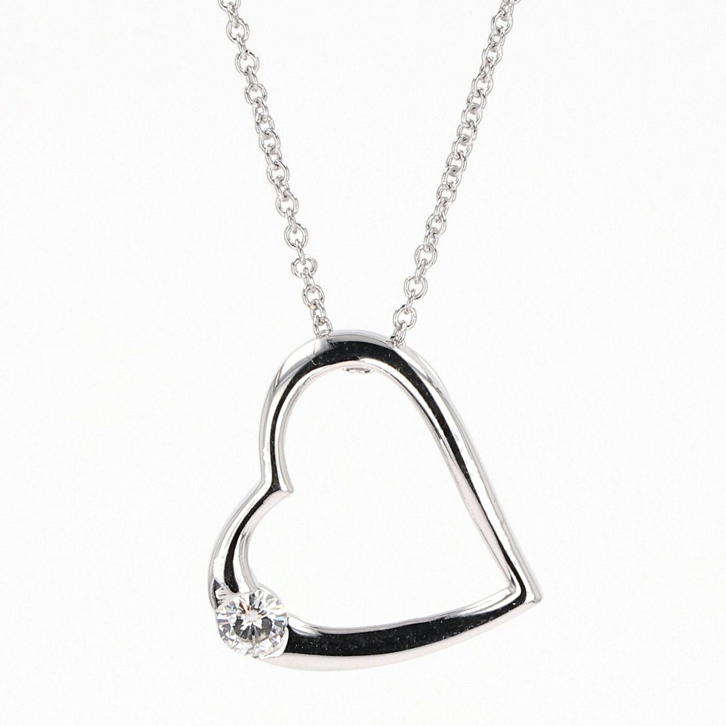 0.13 CTW DEW Moissanite Heart Pendant in Sterling Silver