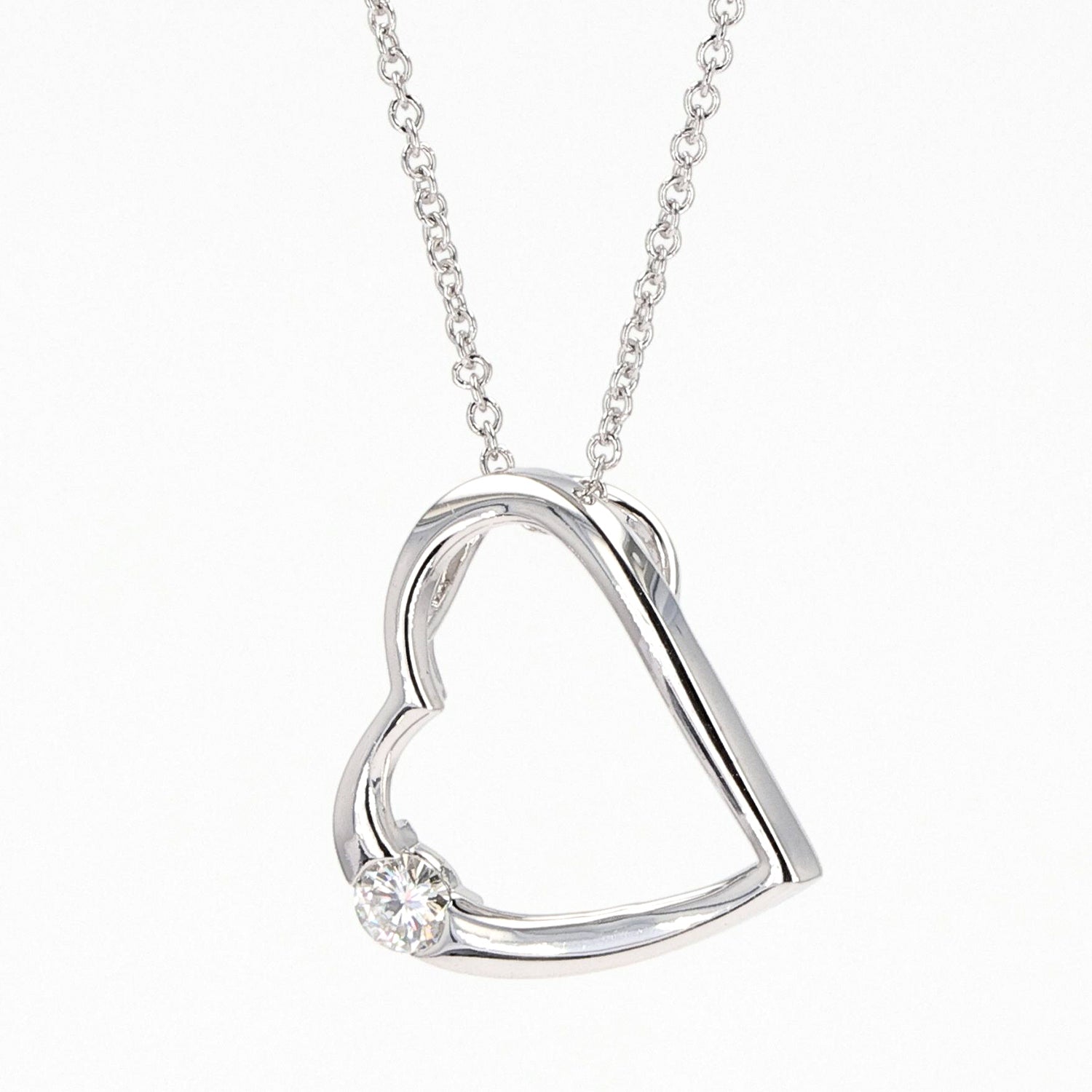 0.13 CTW DEW Moissanite Heart Pendant in Sterling Silver